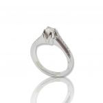 White gold single stone ring k18 with diamond on V shaped bezel and little diamonds fitted on module (code P1919) 